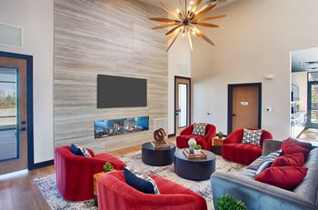 Modern clubhouse with lounge space and fireplace